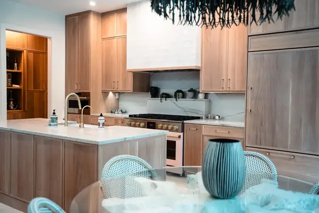 Custom wood kitchen remodel with granite countertops, stained shaker cabinets and stainless appliances in Palm Beach County